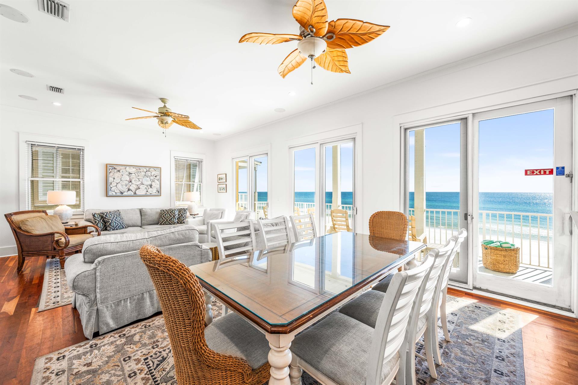 Dine with a view or lounge with a breeze in the 2nd 
 floor great room with balcony.   Space for everyone in this livingdining area, chefs kitchen, 50 tv,  expansive views of the Gulf, covered balcony the width of the home on all 3 levels