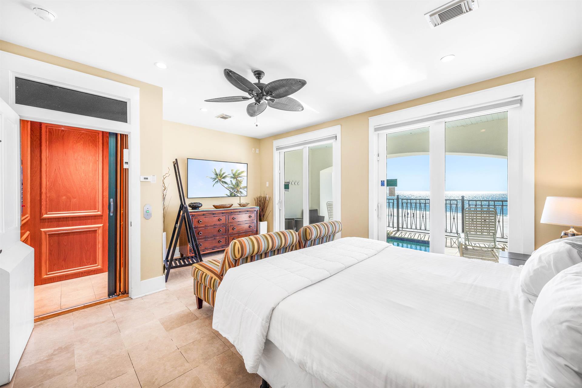 1st Floor King Bedroom, Balcony and Pool Access, Elevator and Full Bathroom