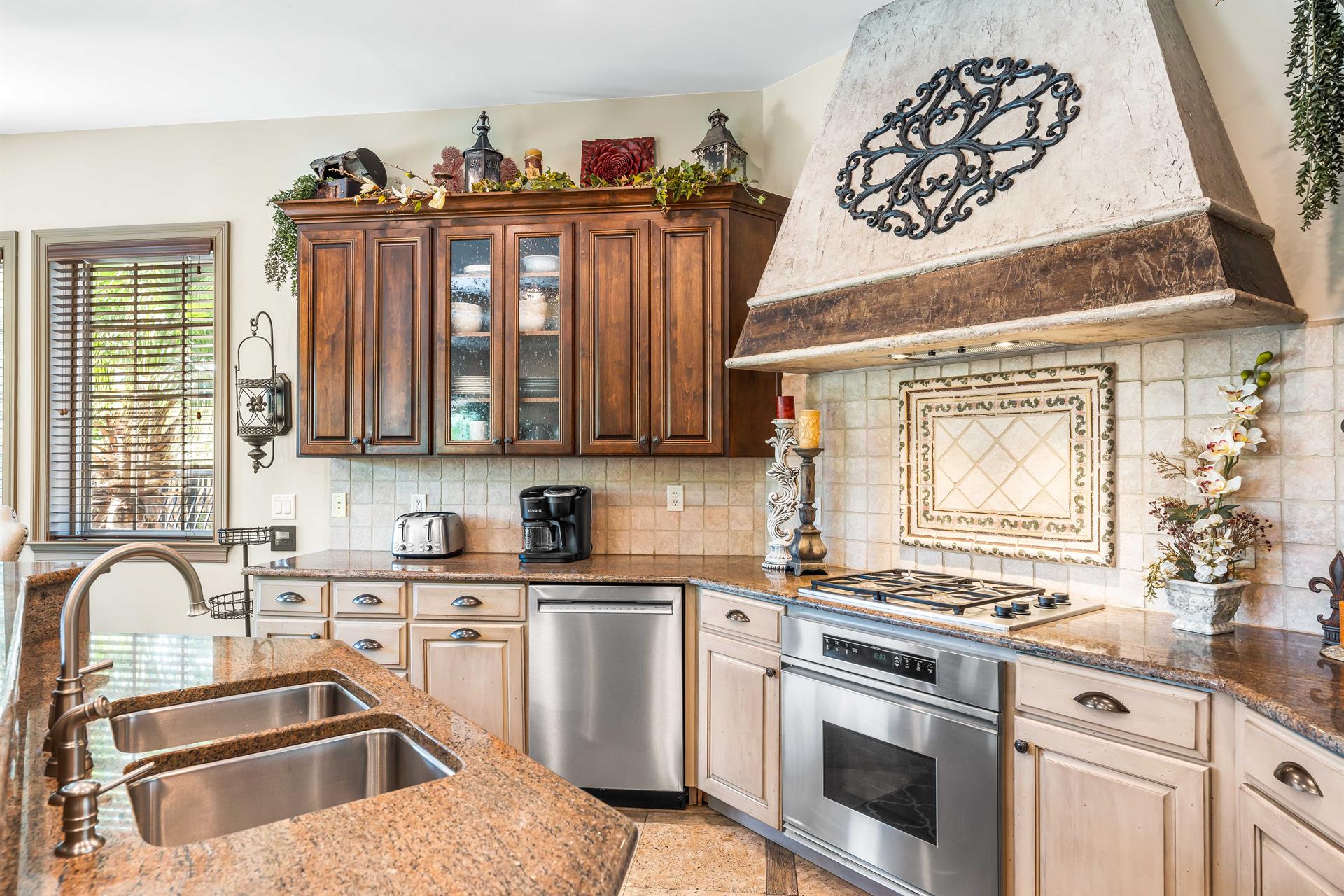 Chefs Kitchen on the 2nd floor with double stainless steel sinks, Dacor gas cook top and oven.
