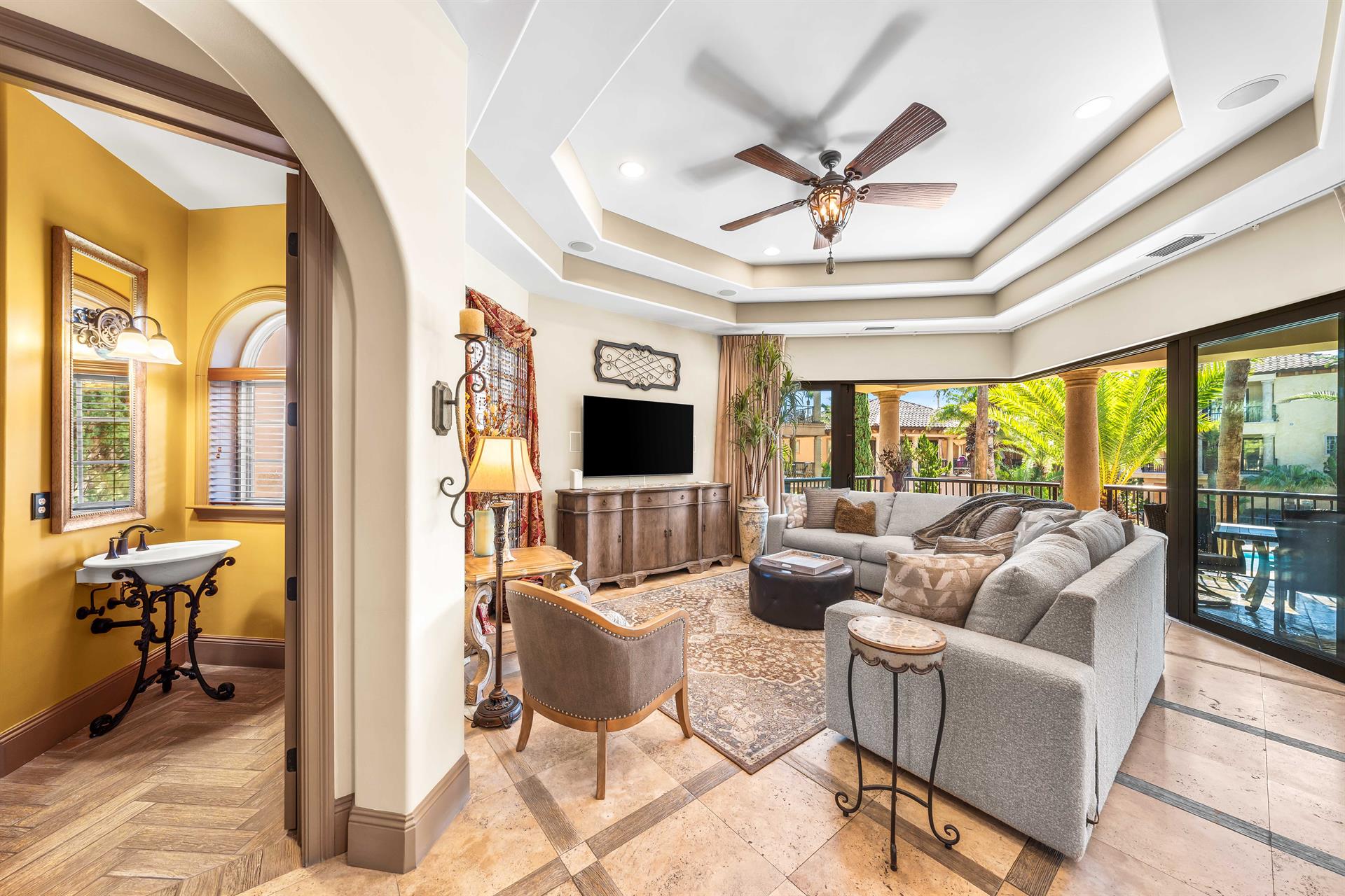 Arched doorway leading into the power room from the living area.
