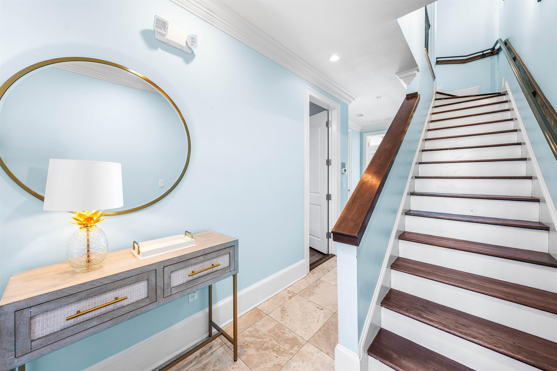 Elegant First Floor Foyer.  Take the stairs or the elevator to the upper levels.