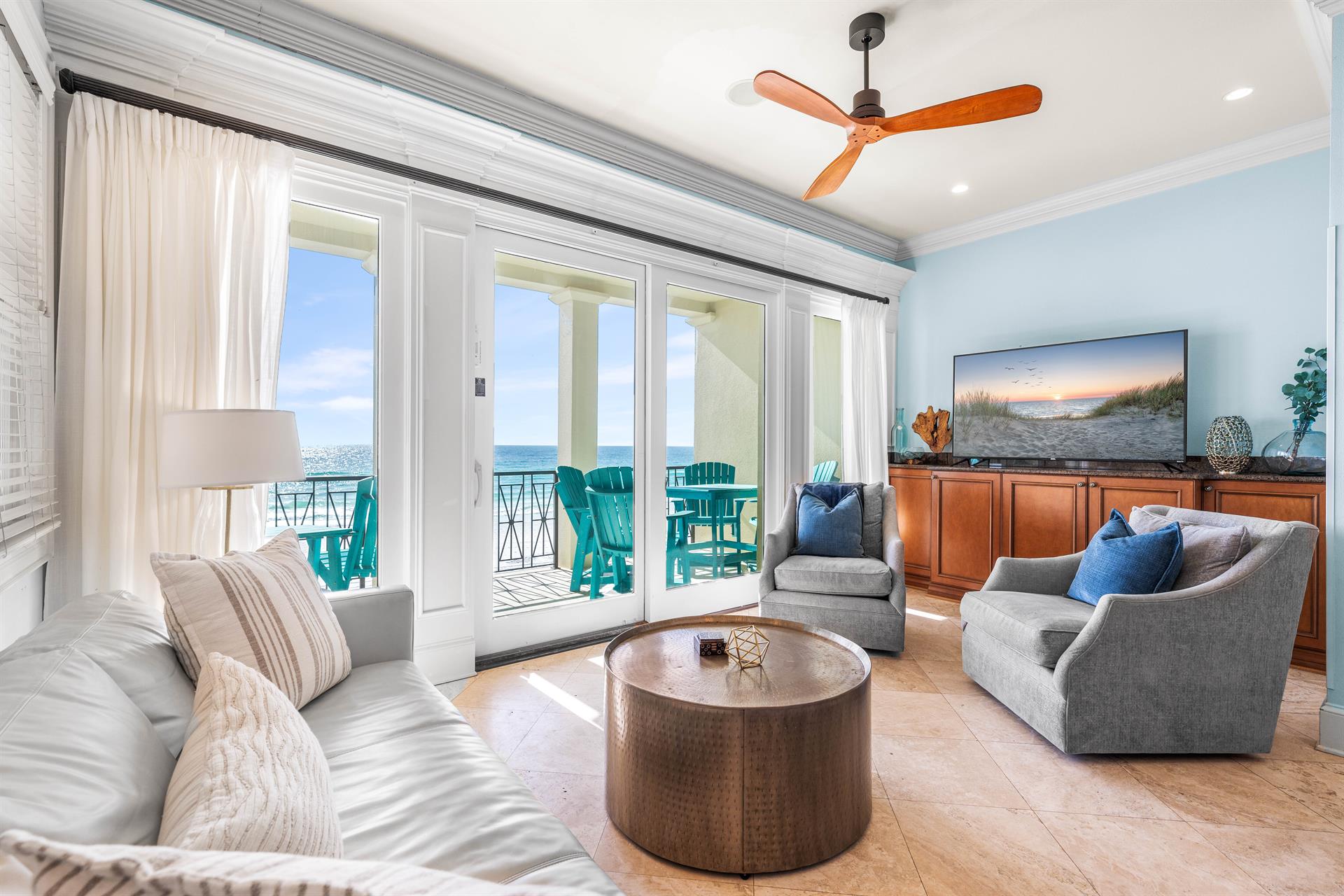 Elegant Furnishings Continue in the 2nd Floor LivingDining Area with 65 Smart TV with Cable, Dining Table for 6  Bar Seating for 2.  Covered balcony with outdoor seating and dining table for 6  all with Gulf Views