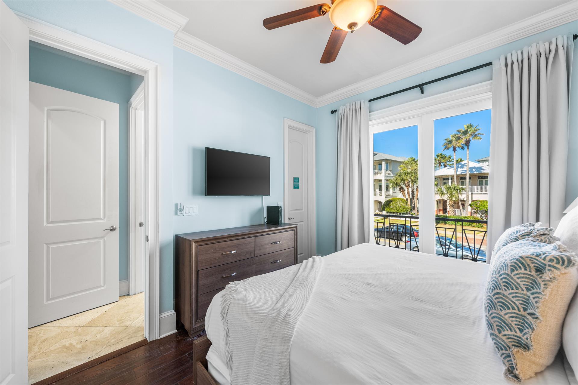 Second Floor Bedroom with King Bed, 42 TV, WalkIn Closet, Ensuite Bathroom  Balcony Overlooking the Frangista Beach Community.