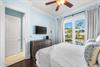 Second Floor Bedroom with King Bed, 42 TV, WalkIn Closet, Ensuite Bathroom  Balcony Overlooking the Frangista Beach Community.