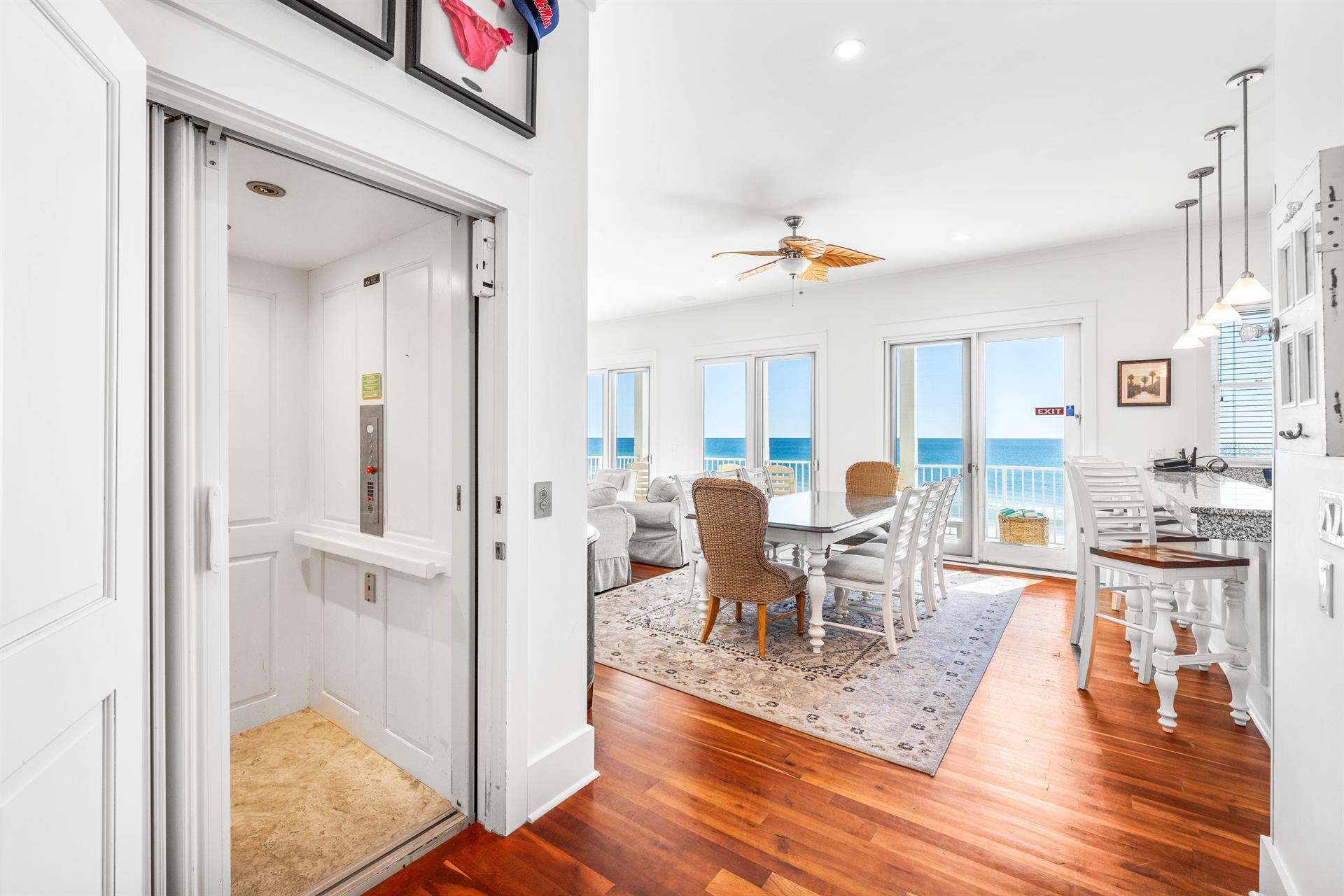 Take the Elevator down to the 2nd floor and step inside this large great room with living, dining, kitchen, and a 40 Gulf front balcony