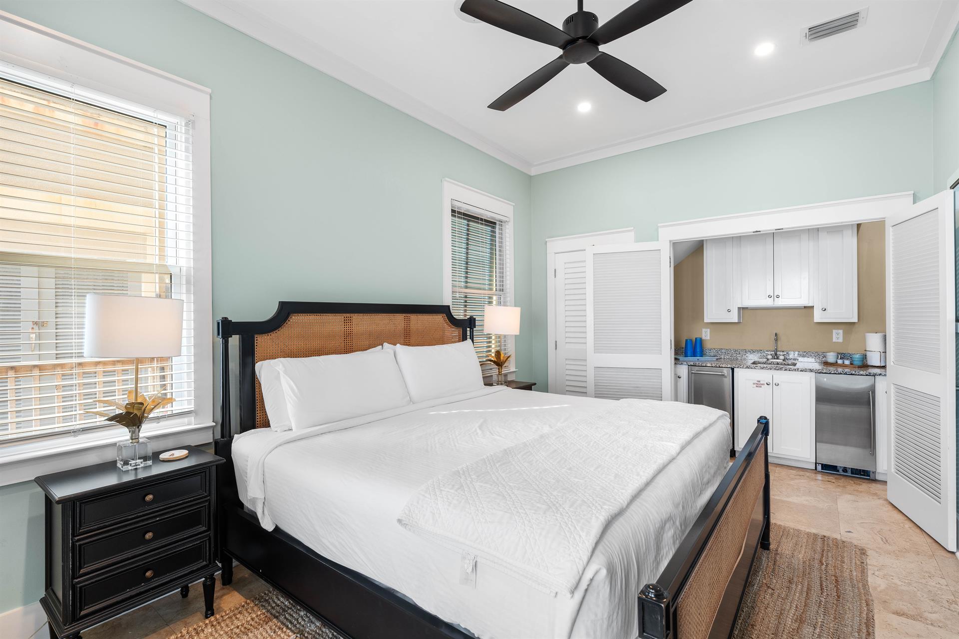 Another view of this serene Gulf front bedroom and   wet bar,