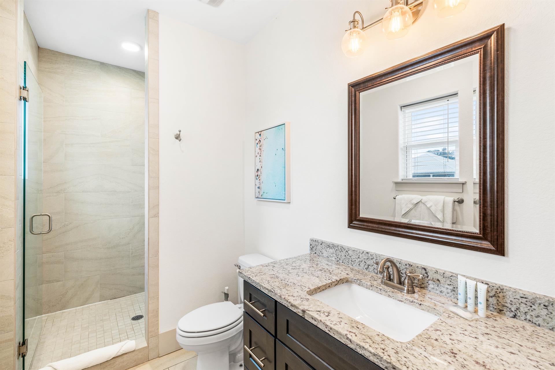 En suite full bathroom for the 2nd floor king bedroom with walkin shower