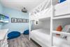 First Floor Bunk Bedroom with Four Queen Beds  33 Smart TV.  The Kiddos will Love It