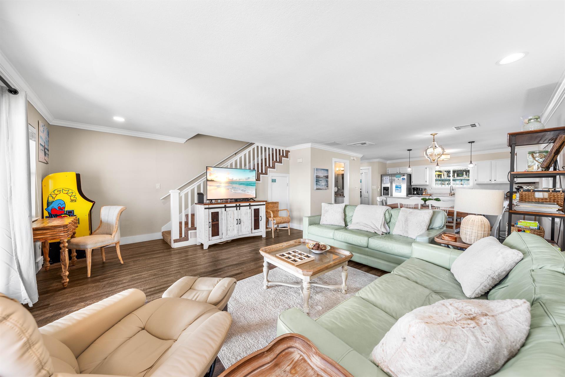 Pac Man 12 game arcade. Desk with a view of the Gulf. 2 leather sofas 1  sleeper  55 smart tv