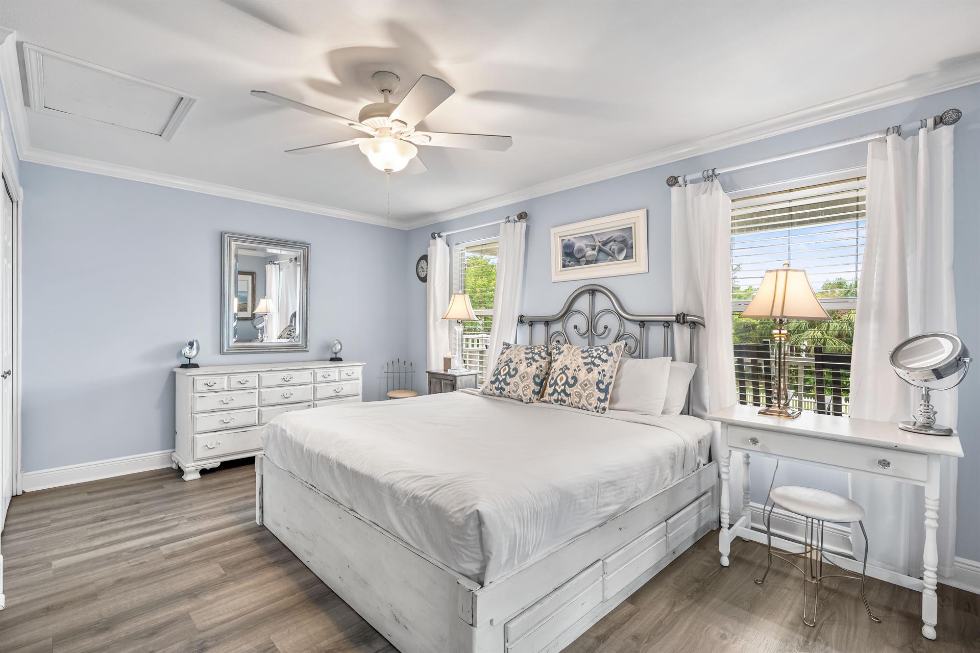 2nd floor King Bedroom 3 is the primary bedroom suite on the second floor with 42 smart tv, balcony access and ensuite bathroom.  Bonus minirefrigerator with coffee setup.