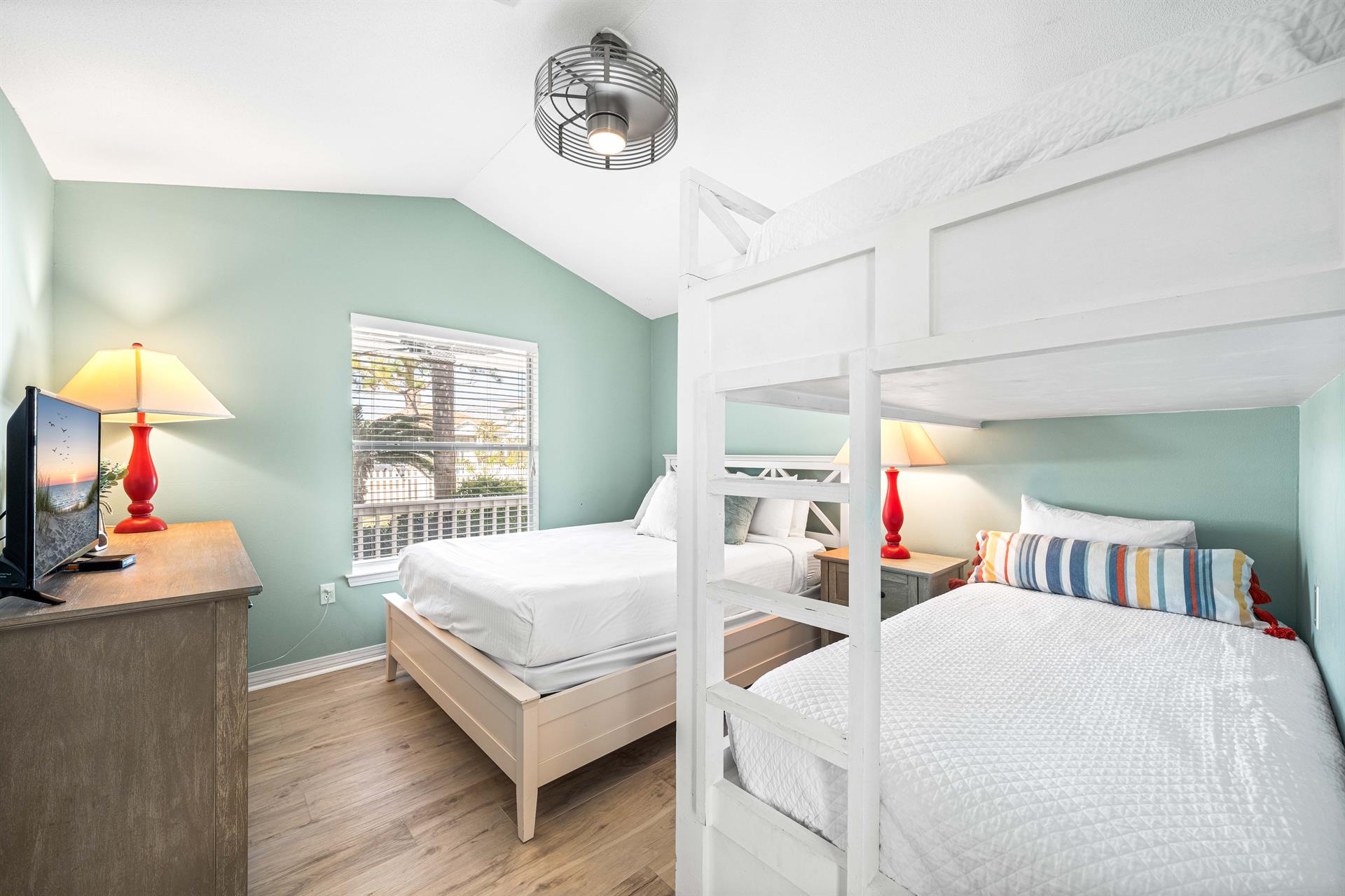 The Kiddos and Adults will Love this Room A Queen bed with 2 Twin XL Beds and a 32 TV with Cable.