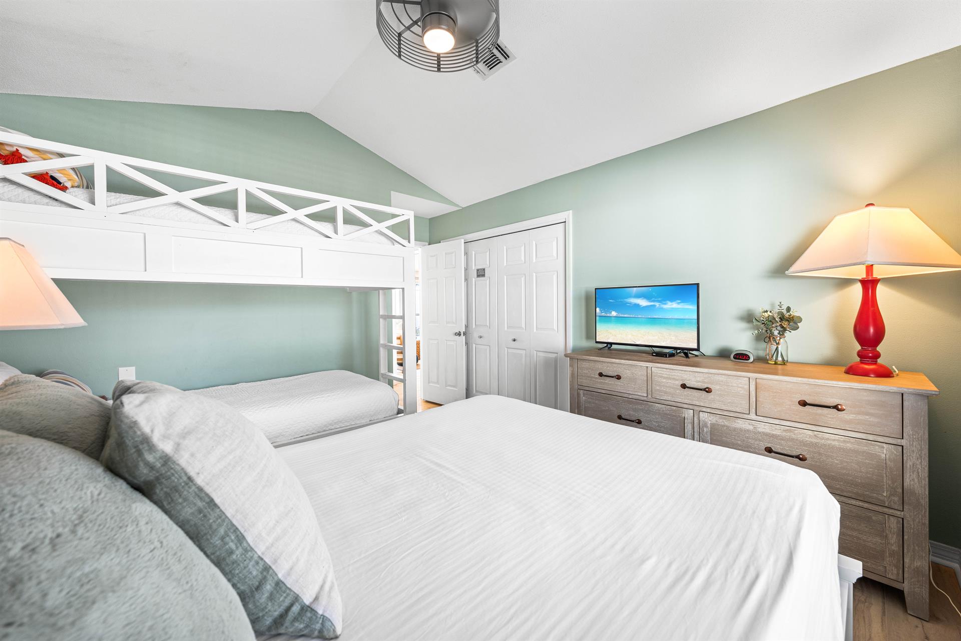 This Room has a Dresser to Unpack those Suitcases and a large Closet with a Front Yard View