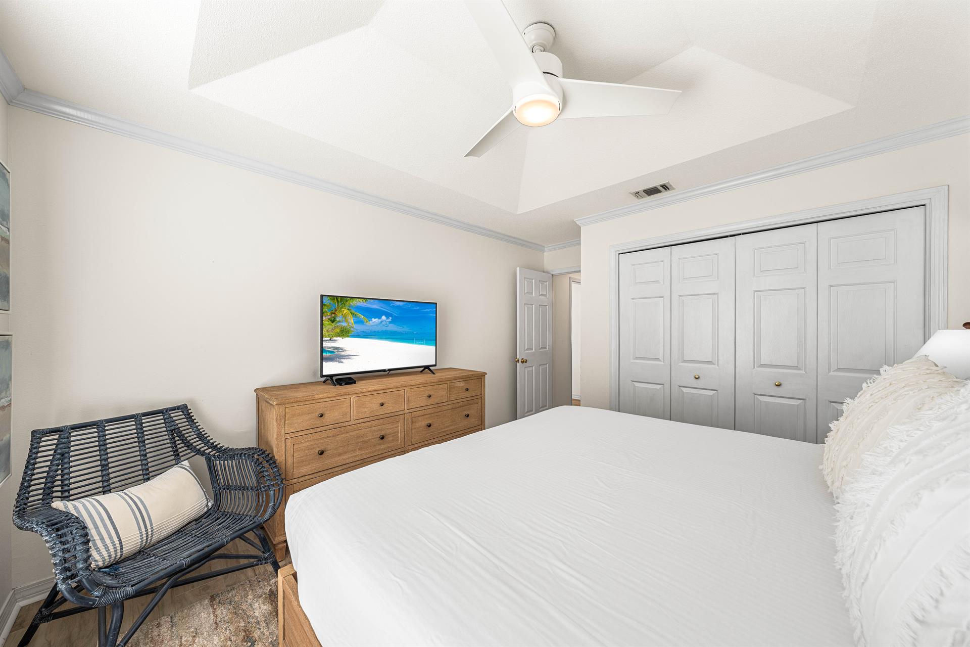 King Bedroom with a Pool View, Large Dresser, Night Stands for Placing your Favorite Book and a Large Closet  42 Cable TV and Additional Seating