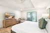 This Primary King Bedroom also has Access to the Outdoor Covered Dining Area and Pool.