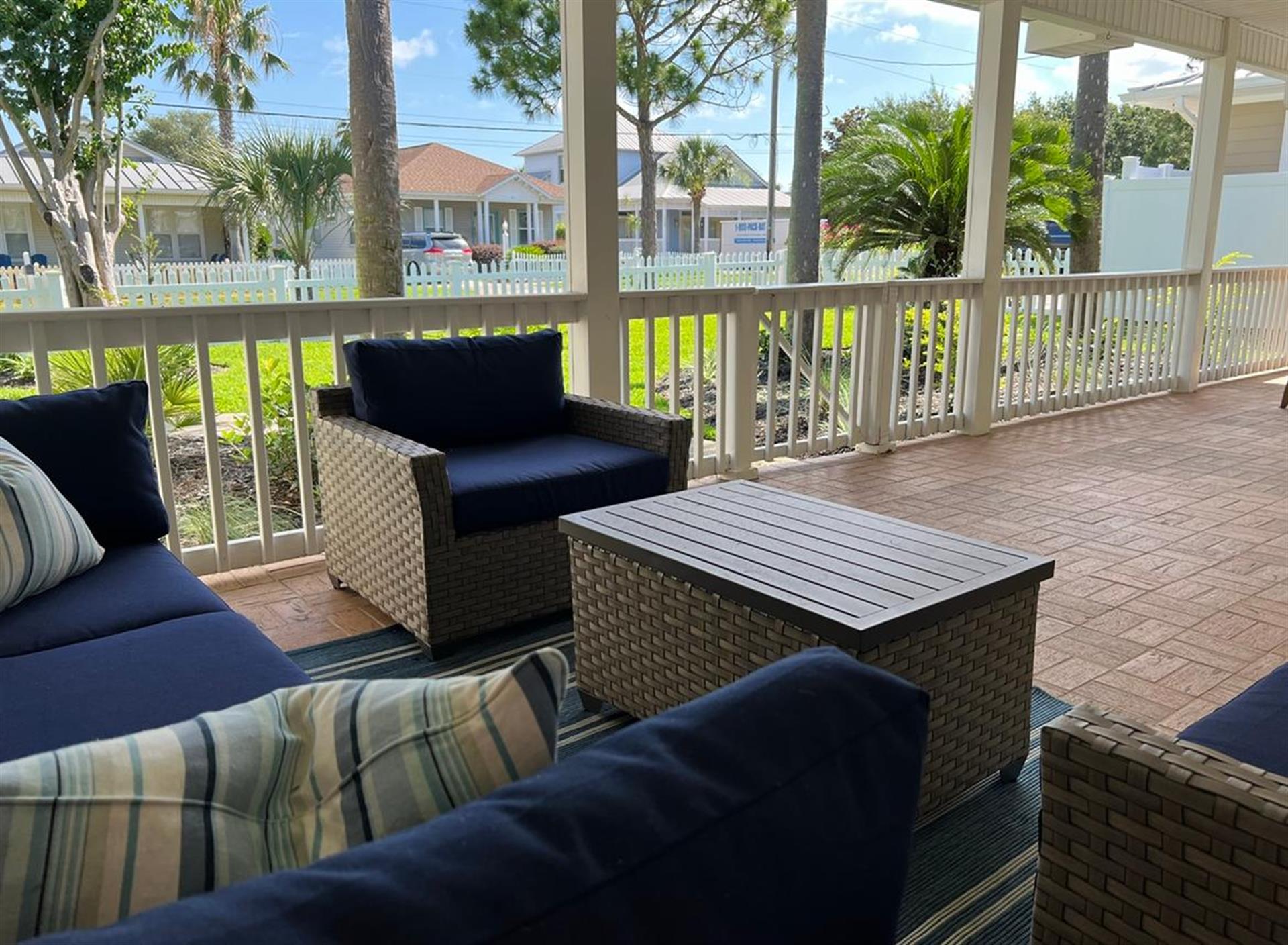 Large Covered Front Porch with Plenty of Seating
