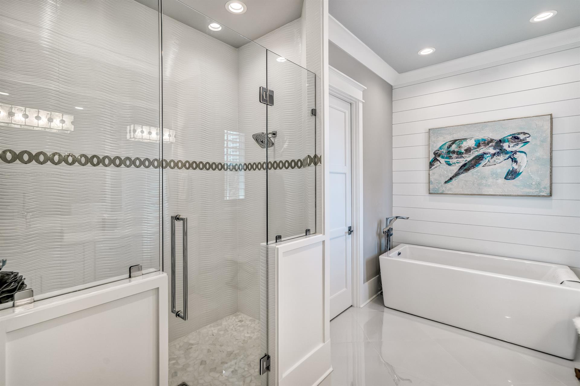 Third floor Master suite bathroom number one soaking tub and shower.