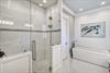 Third floor Master suite bathroom number one soaking tub and shower.