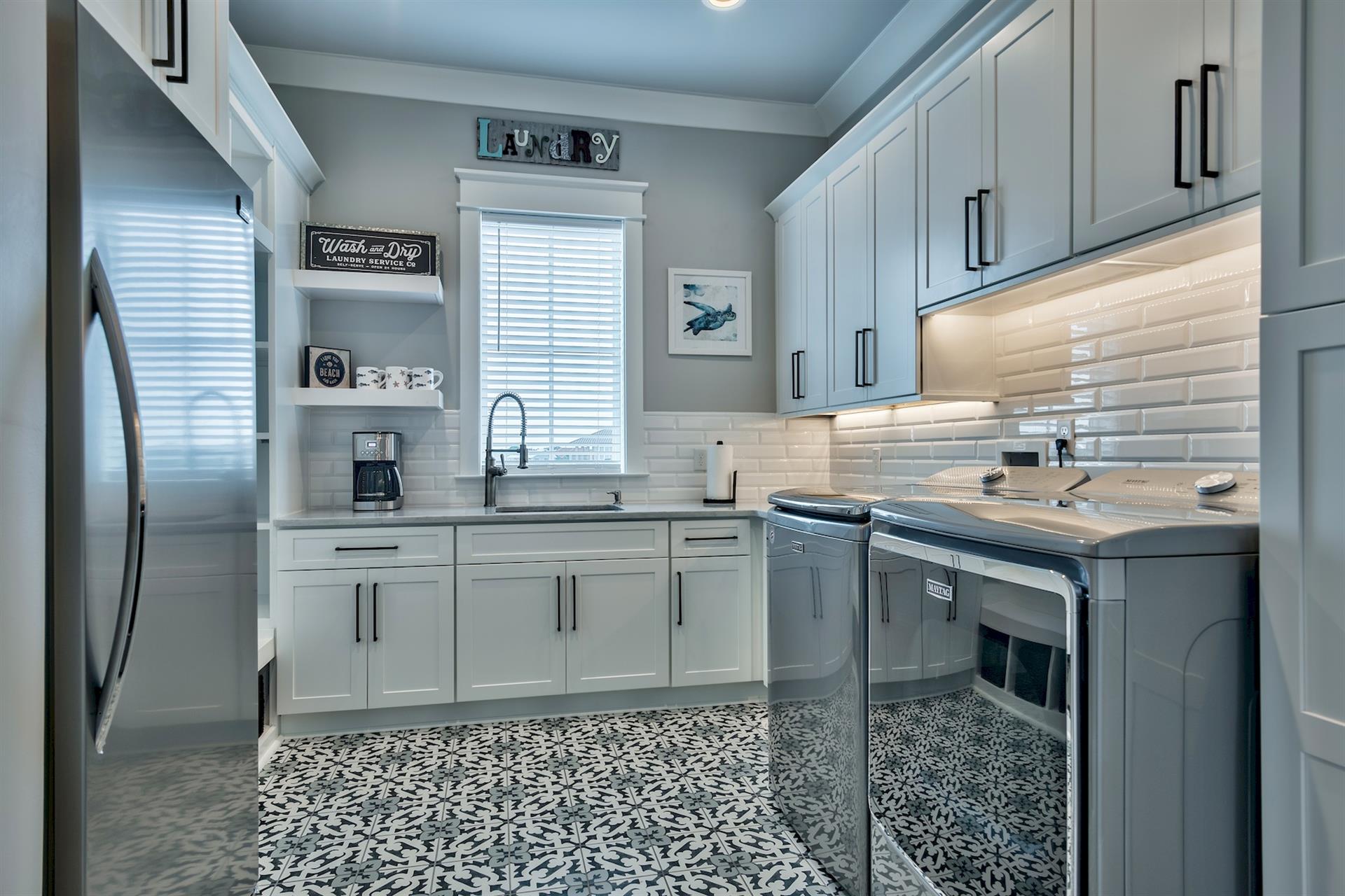 Third floor laundry and mini kitchen.