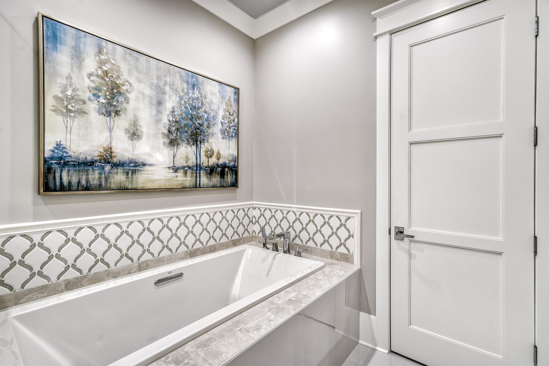 Third floor Master suite number two with soaking tub and shower.