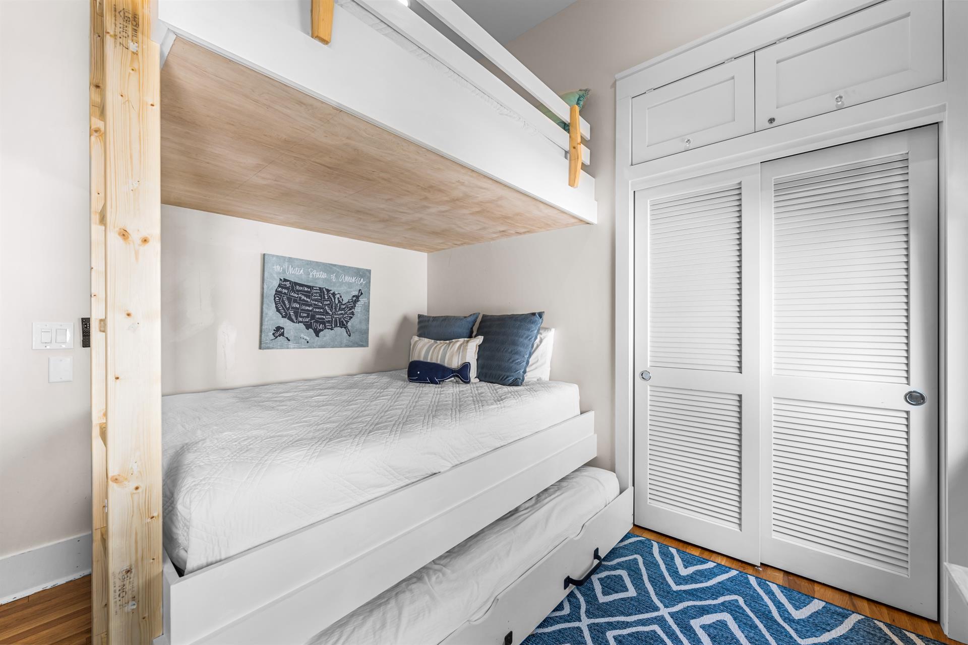 Bunkroom with queen over queen and an optional twin trundle.   Sleeps 4