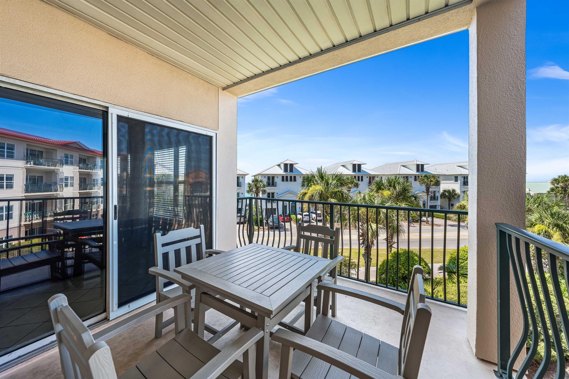 Outdoor Dining Table for 4 with Pool and Community View