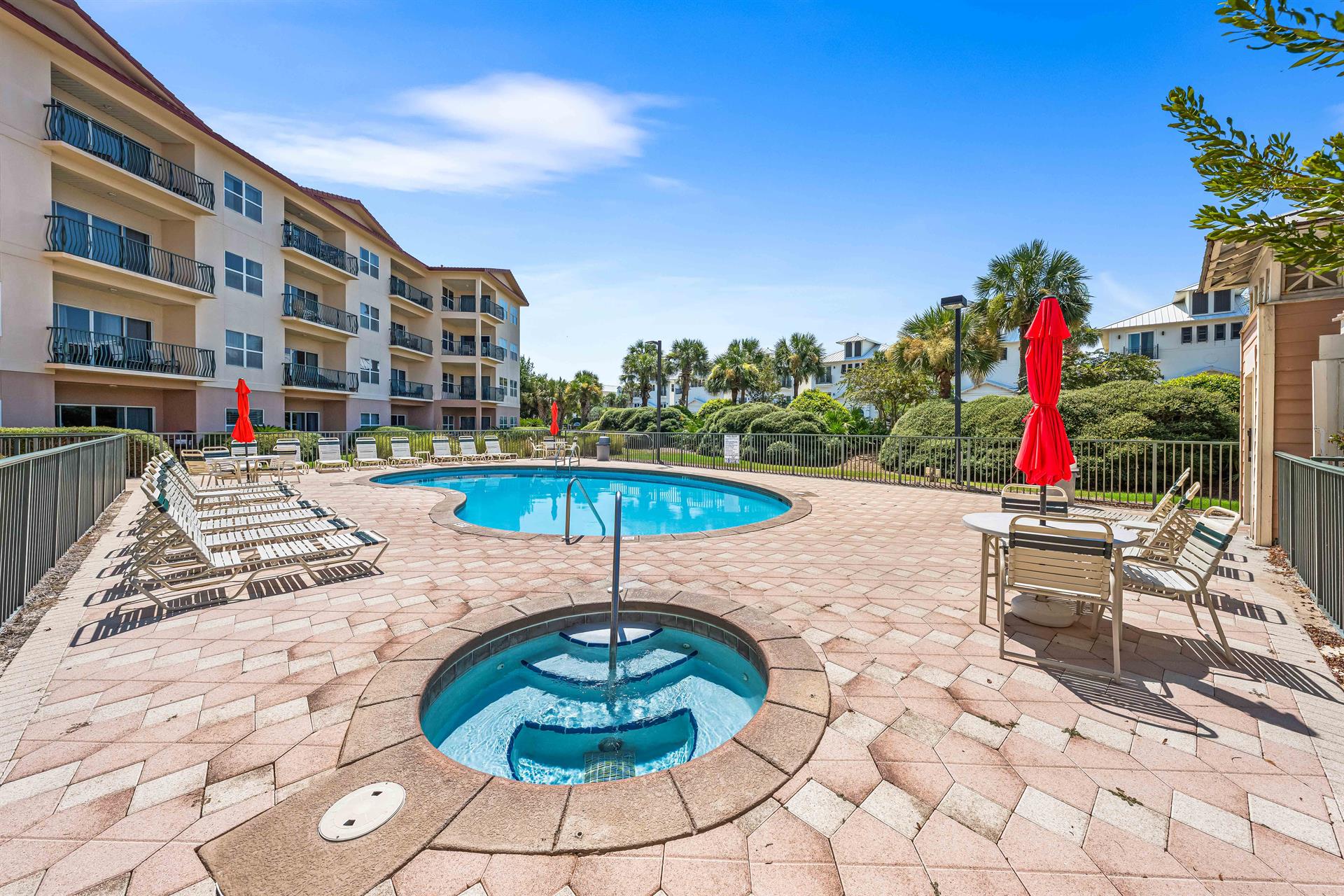 Community Pool and Hot Tub with Plenty of Seating