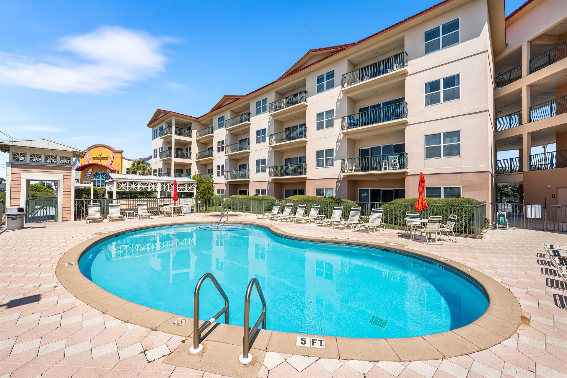 Community Pool and Hot Tub with Plenty of Seating