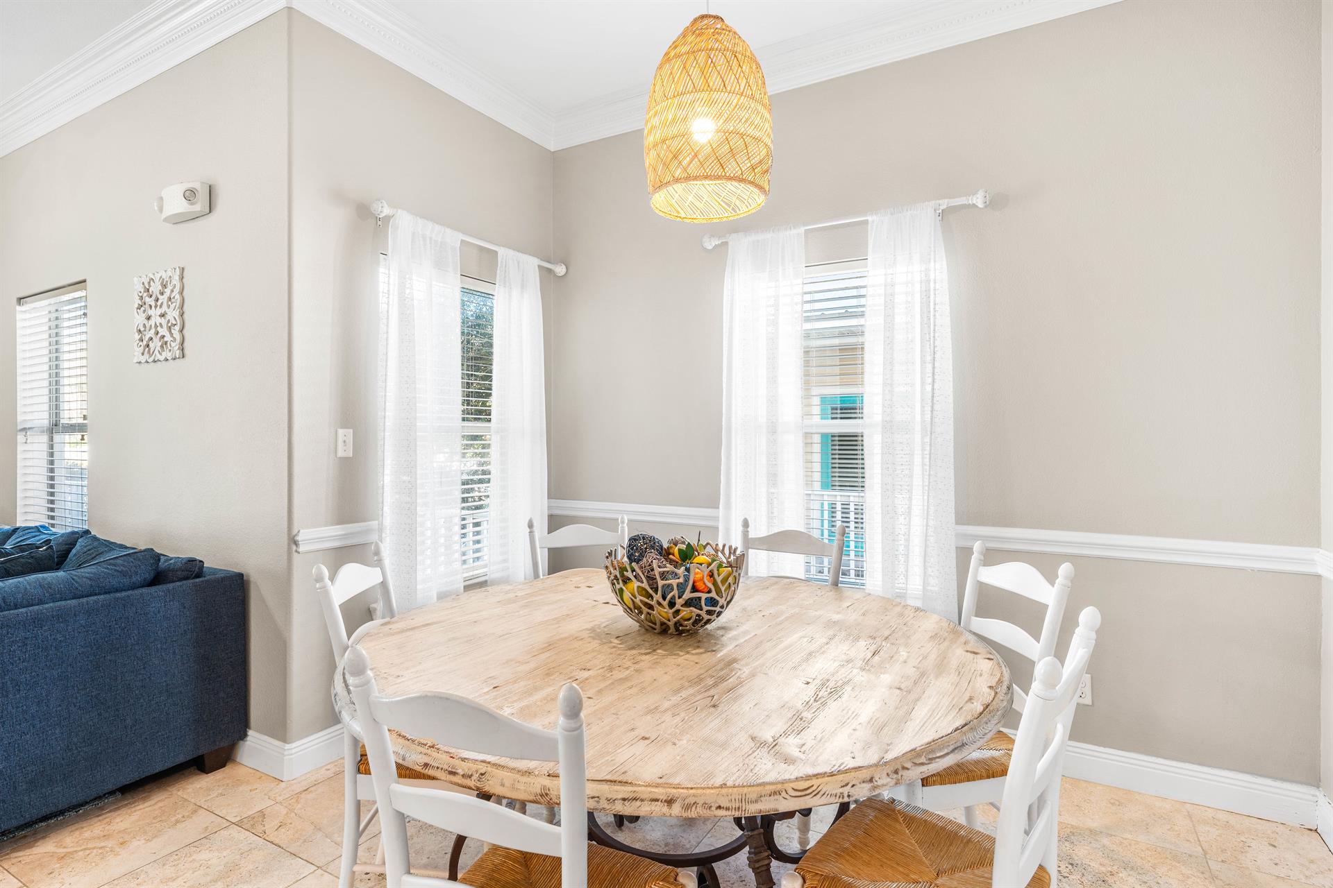 The round dining table makes conversation more enjoyable