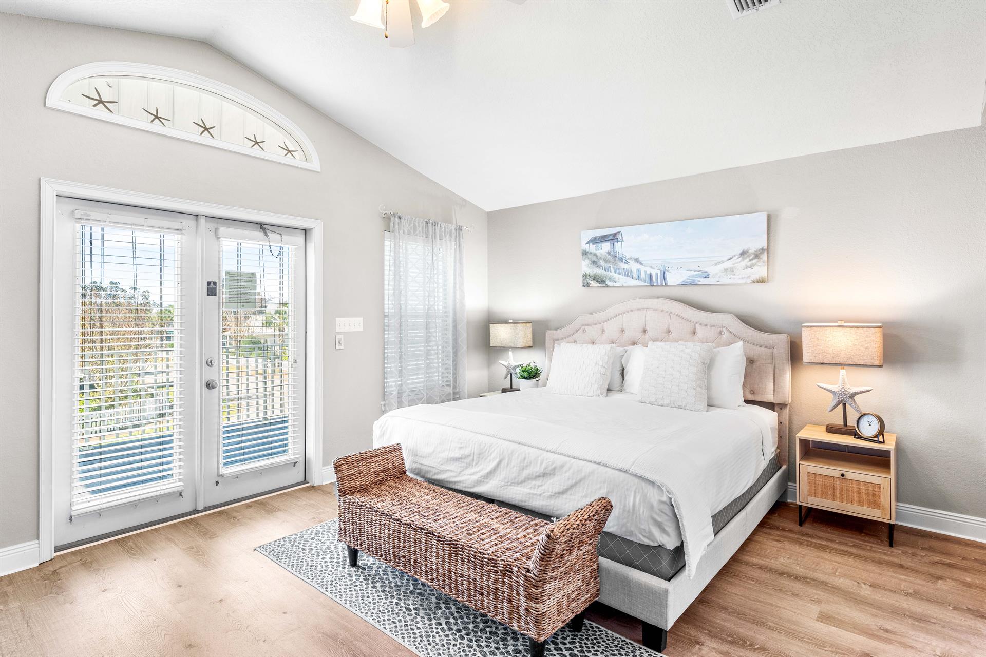 Primary King Bedroom with Private Balcony, Ensuite Bathroom, and 55 Smart TV