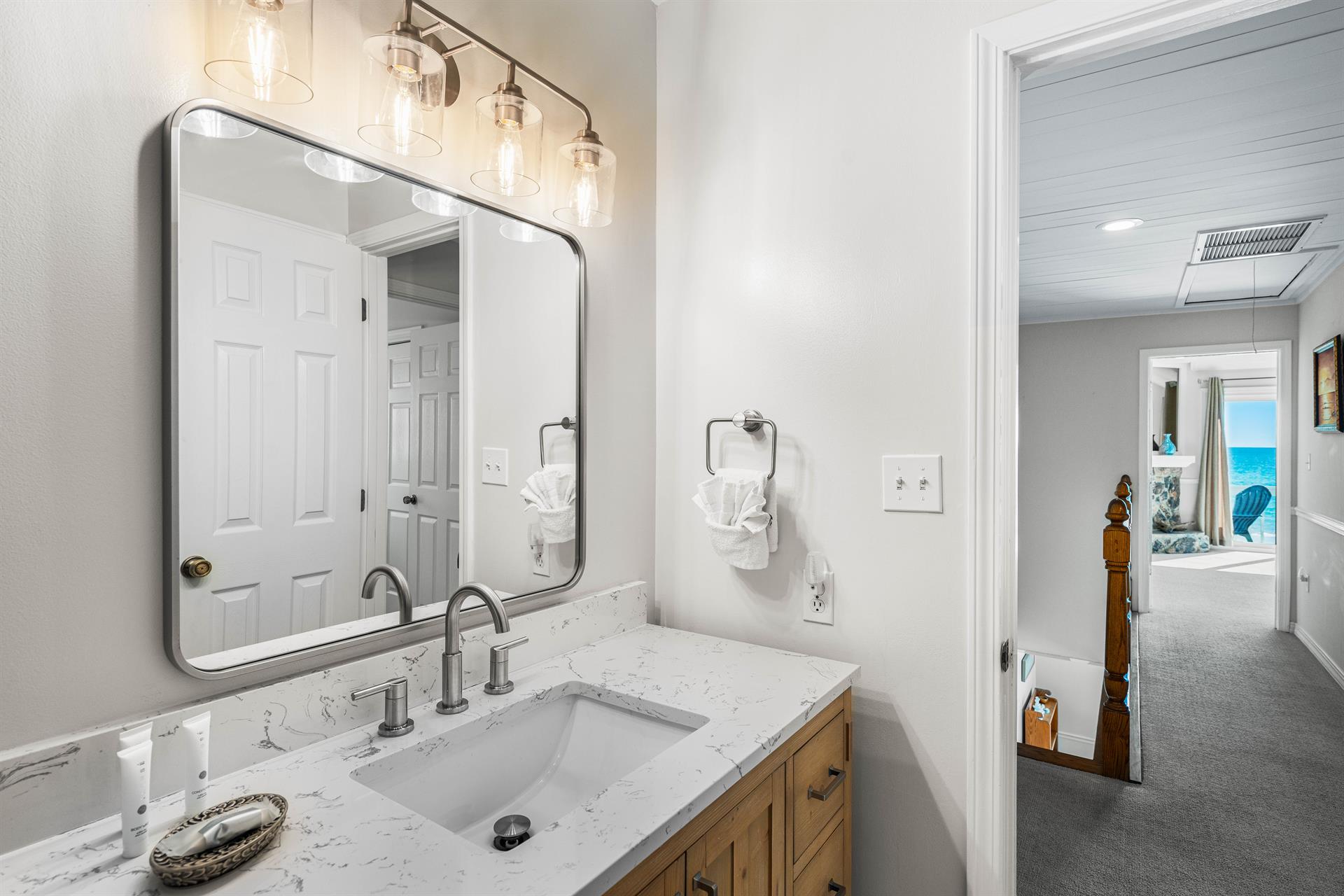 This is the full bathroom with a bathtubshower combination for the queen bedroom, with access out to the hallway.