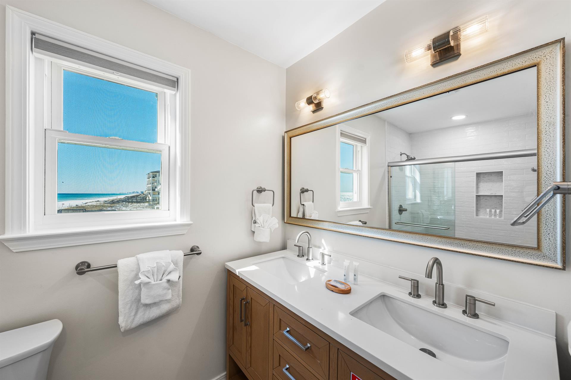 Primary ensuite full bathroom  with a walkin shower.