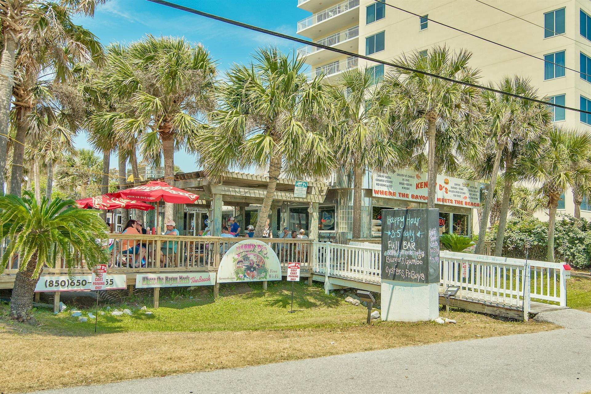 Kenny Ds Beach Bar  Grill is right across the street  Cajun cuisine, seafood  oysters, karaoke, and the coolest vibes in town