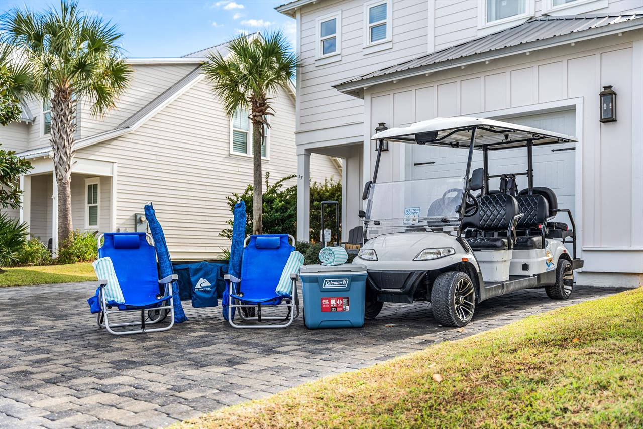 6 Seater Golf Cart, Beach Wagon, 62 Quart Beach Cooler,6 Additional Back Pack beach Chairs and 3 Umbrellas for your use YEARROUND