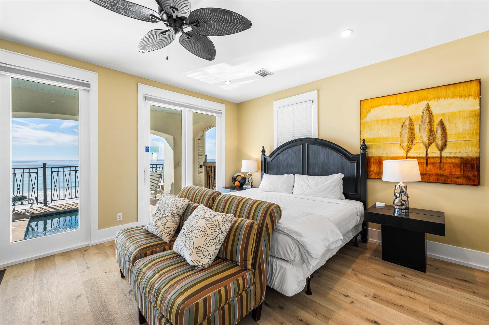 First Floor King Bedroom with ensuite Bath Overlooking the Splash Pool and Gulf Views.