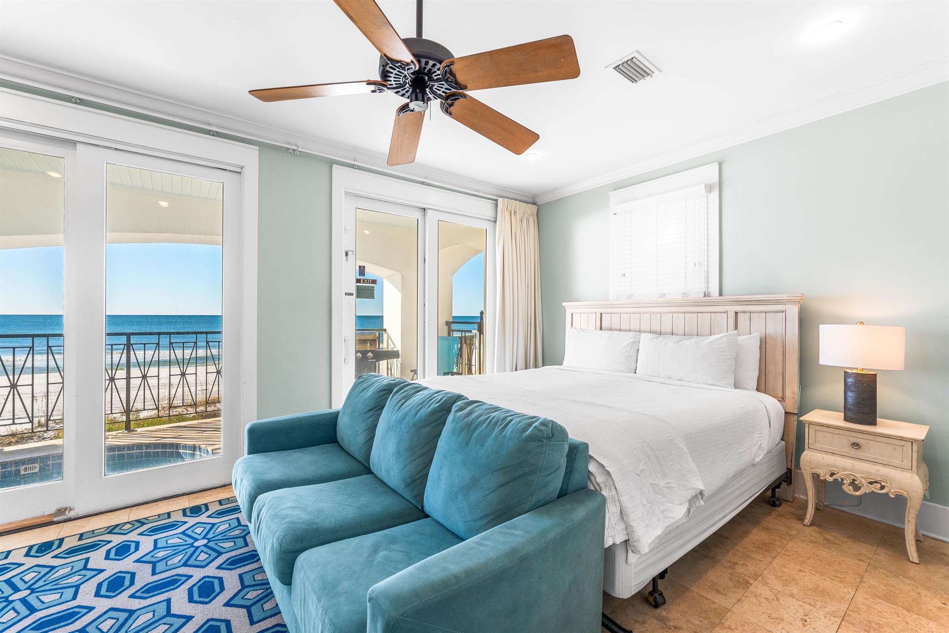 The 2nd of two Gulf front king bedrooms with ensuite bathroom, balcony with splash pool   sleeper sofa  all located on the 1st floor.