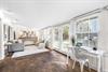 A traditional Florida Room in Seabreeze with a sleeper sofa, bar cabinet, a desk,  access to the pool area through French doors. safety alarm
Fully stocked Beach Gear closet