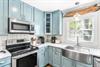 Fully Stocked Kitchen with Stainless Steel Appliances, Cambria Quartz Countertops,  Cookware  Kitchenware,  Breakfast Bar
