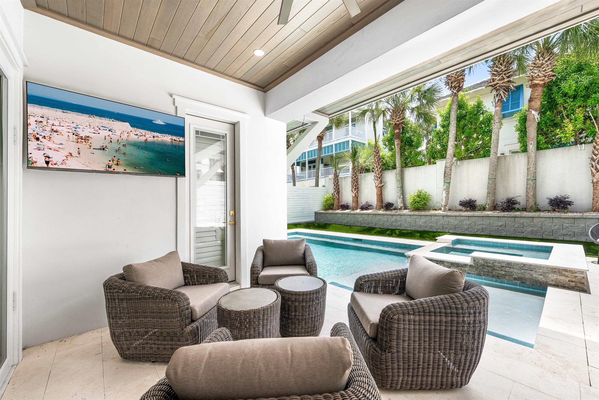 Covered Pool Patio Grilling area Pool side 55 Smart TV and Beverage Cooler