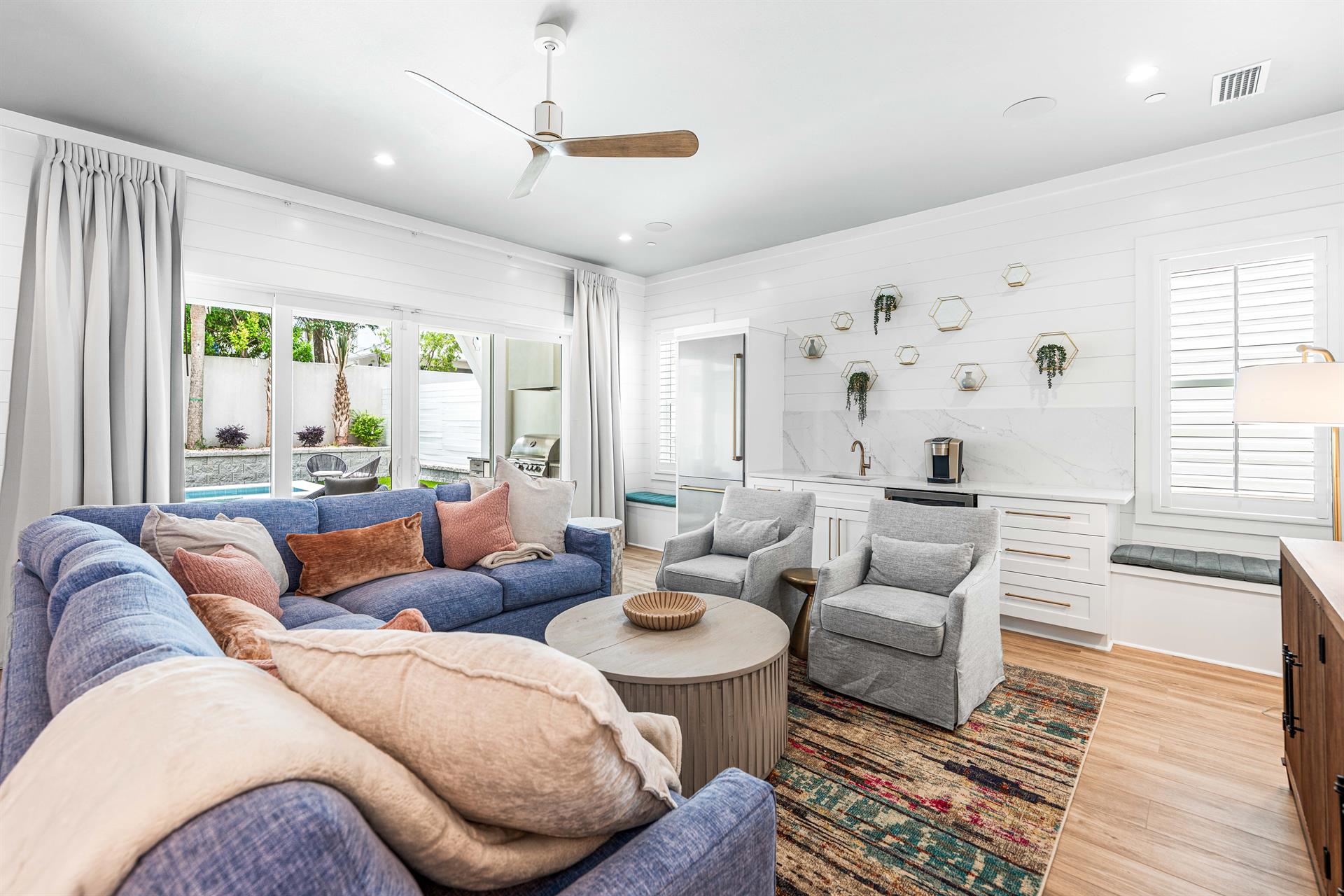 First Floor Cabana Living Pool Area with Full Size Fridge and Coffee Bar and Beverage Cooler 75 Smart TV