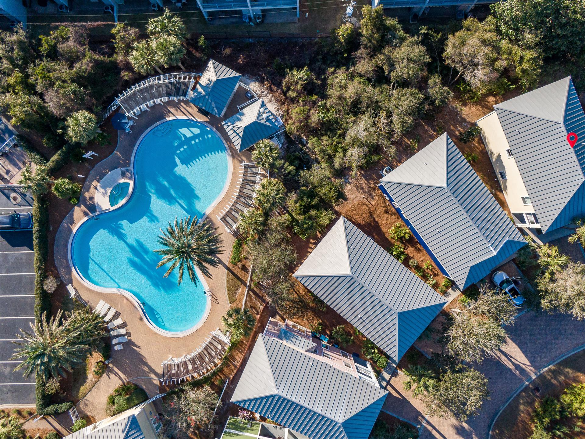 Giant lagoon style pool with separate heated spa for this small familyfriendly gated community.