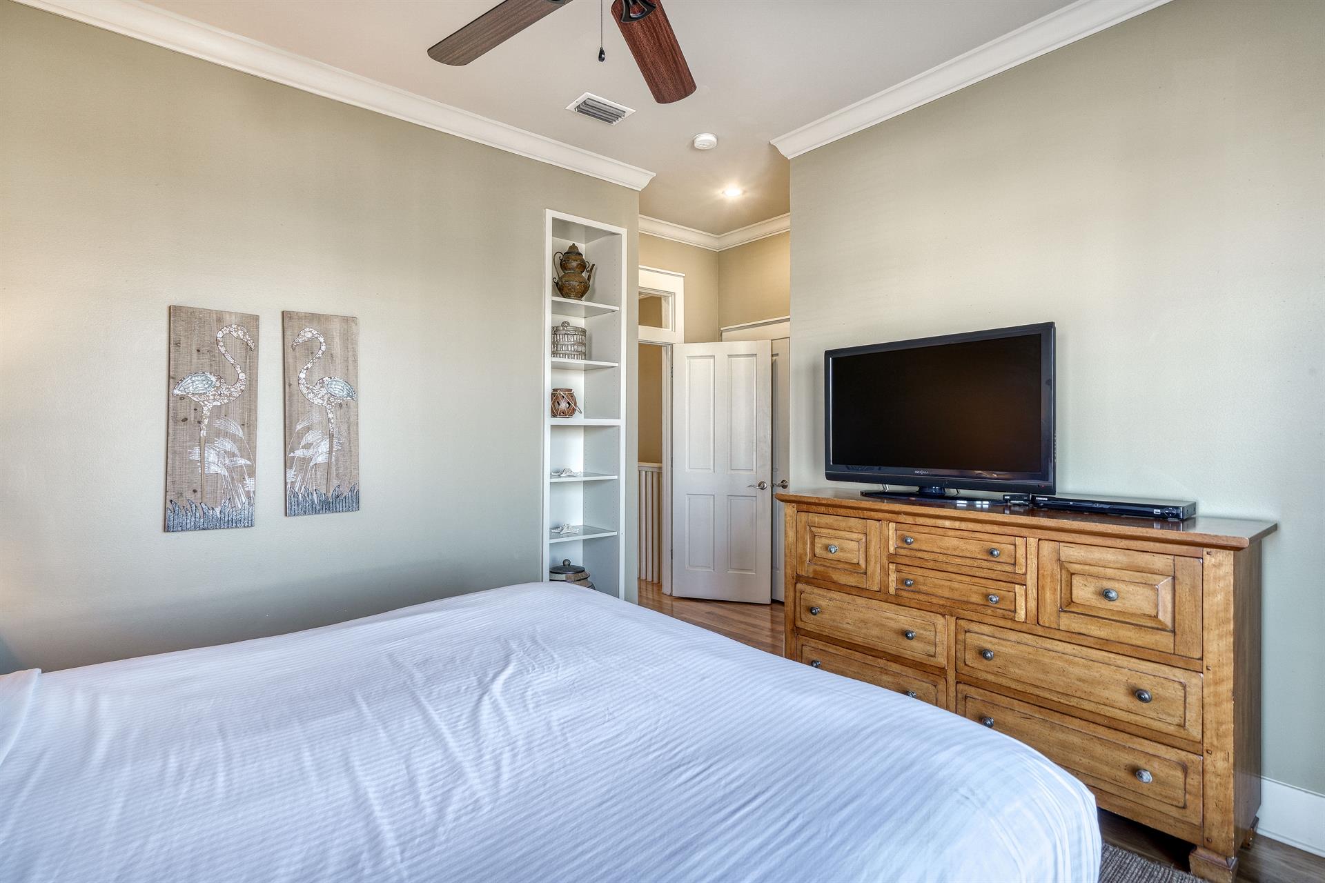 3rd Floor Guest Bedroom with King Bed, Ensuite Bathroom  Balcony Overlooking the Frangista Beach Community.