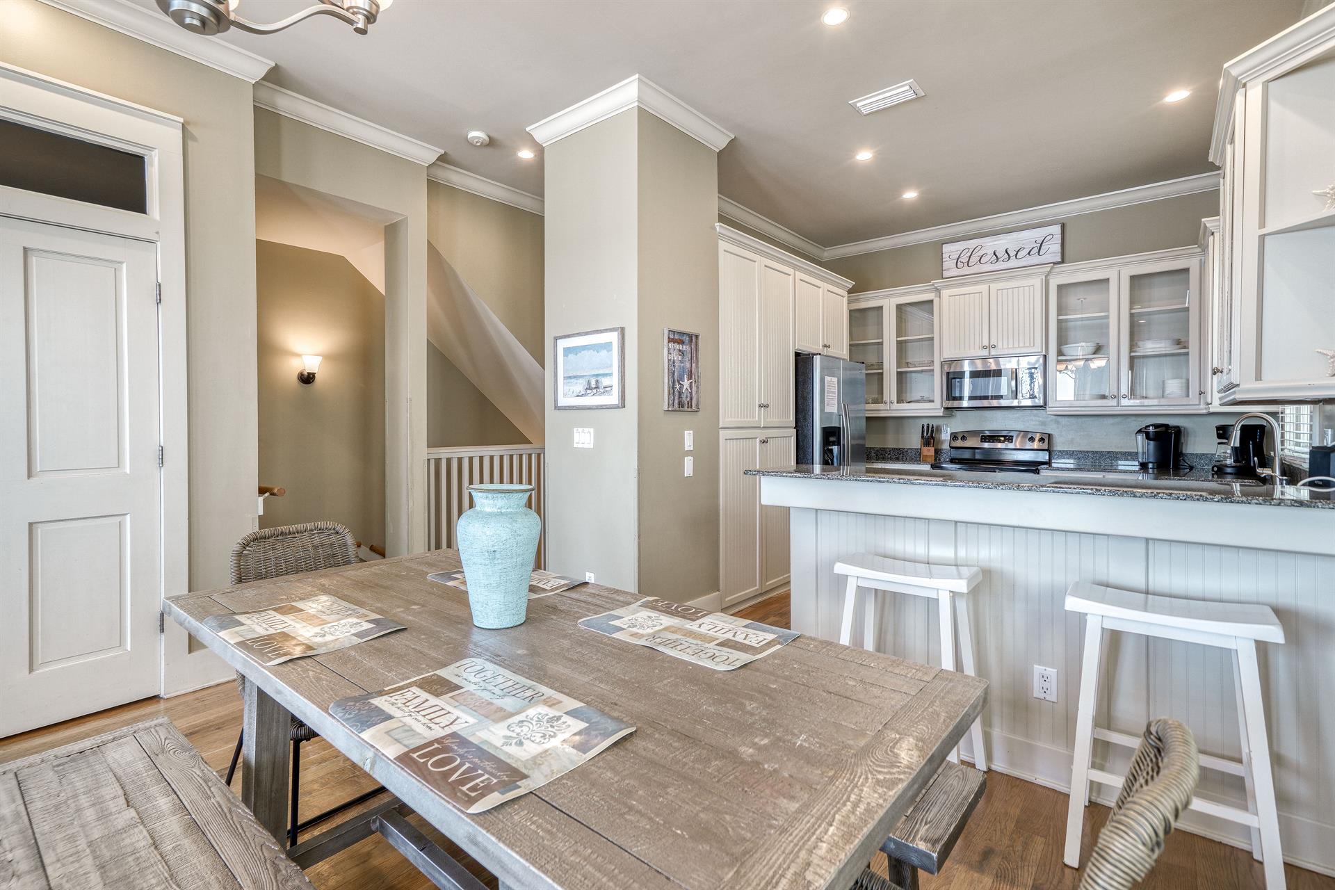 Cooking And Dining On The Beach   Fully stocked kitchen with granite countertops and stainless steel appliances.