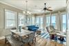 2nd floor living  dining area with a private beachfront balcony