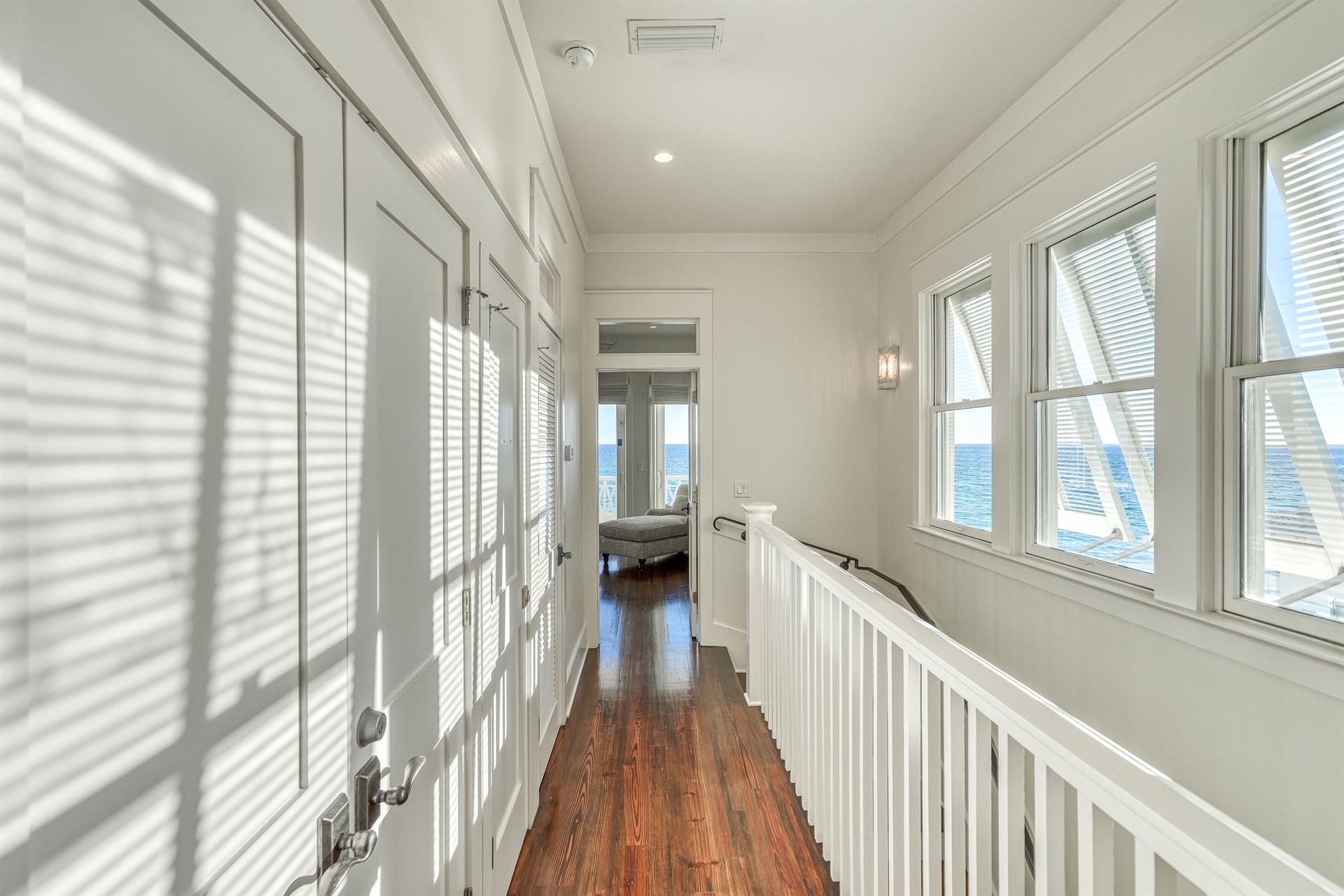 Hallway leading to triple twin bedroom