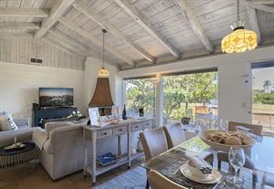Living Room with Decorative Fireplace and HDTV