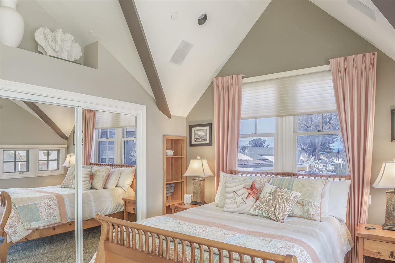 Bedroom 1 with Queen Bed, HDTV, Desk, Balcony