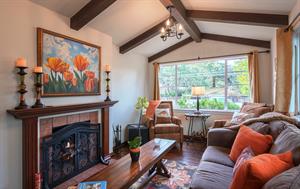 Vaulted WoodBeamed Ceilings and a Gas Fireplace