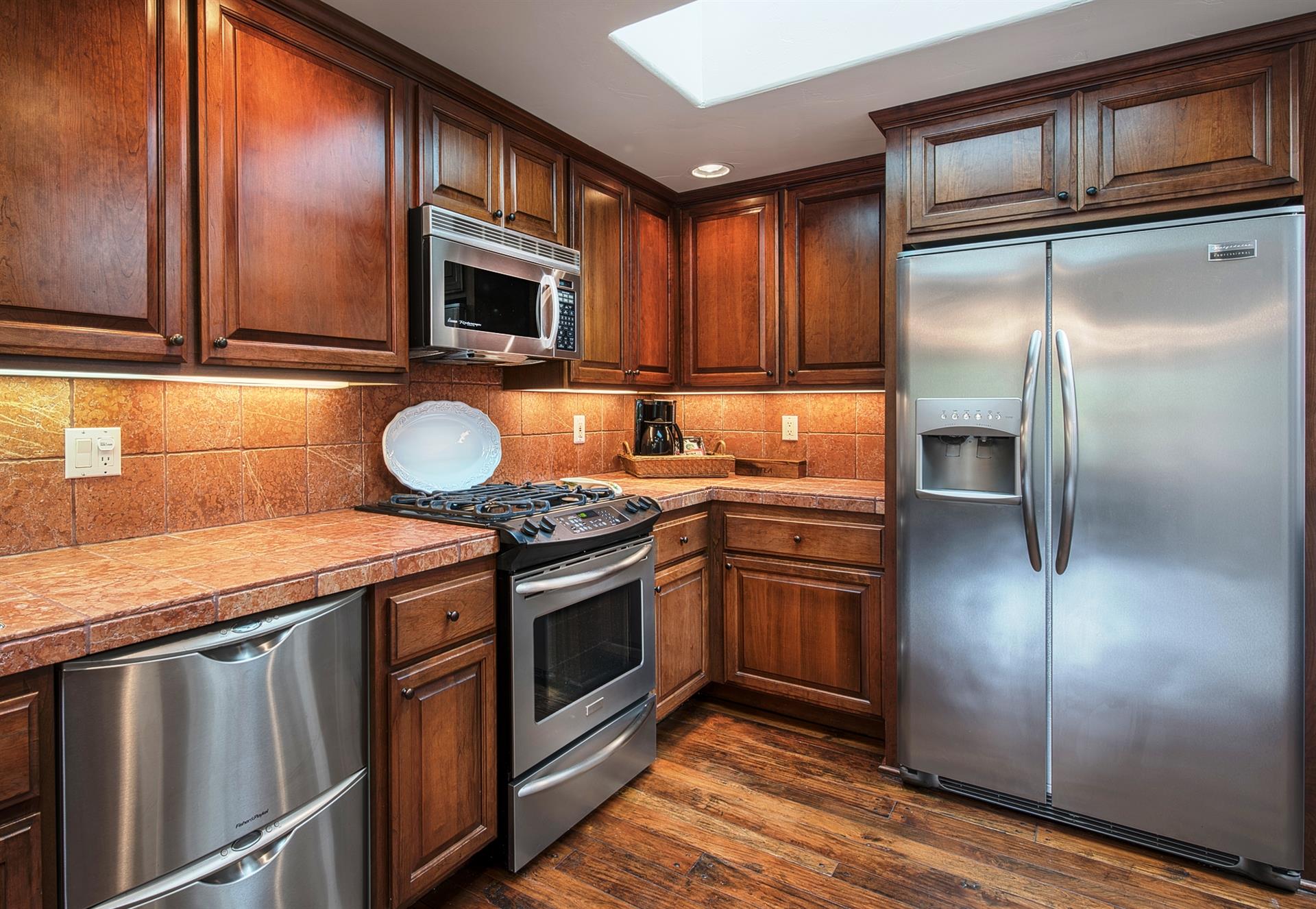 Fully Equipped Chefs Kitchen with Custom Cabinetry