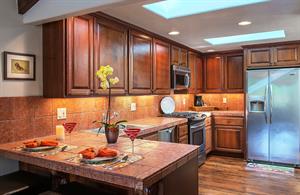 Fully Equipped Chefs Kitchen with Custom Cabinetry