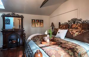 Bedroom 1, King Bed, TV, Electric Fireplace, En Suite Bath
